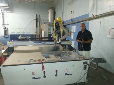 Pictured is Chris Boone, owner of Daynite Signs.
