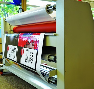 With roll-to-roll lamination, graphics are overlaminated and then rolled back onto a core.