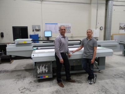 Pictured from left to right are Dany Babakhanian, president and CEO of I-Dent; and Glenn Pineda, production manager).