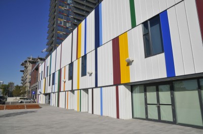 The colourful stripe motif on the exterior of the building continues inside.