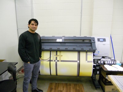 Pictured is Sina Bagherzadeh, graphic artist at Convenience Group.