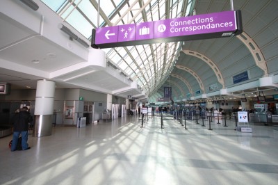 Inspired by London Heathrow Airport, new purple signs direct passengers to connecting flights.