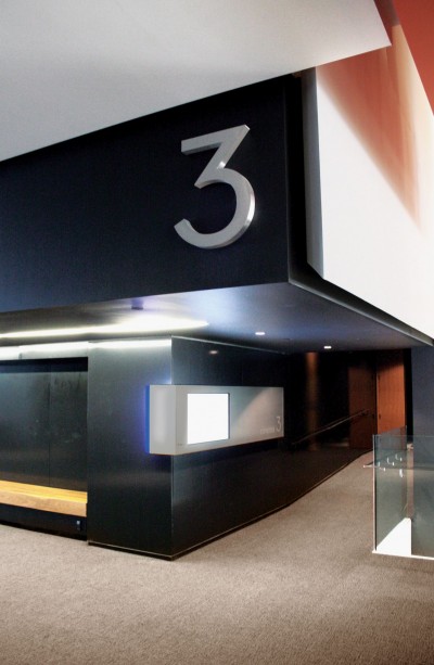 Each cinema is identified with a brushed aluminum channel number. Photo courtesy Entro | G+A