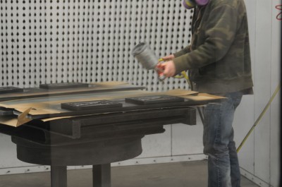 The signs are returned to the paint booth for the application of an automotive-grade clearcoat for greater durability, including resistance against oxidation.