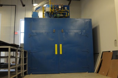 The signs are cured in an oven for eight hours to accelerate chemical crosslinking, which maximizes durability.