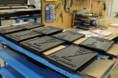 The single-colour signs are allowed to dry overnight.