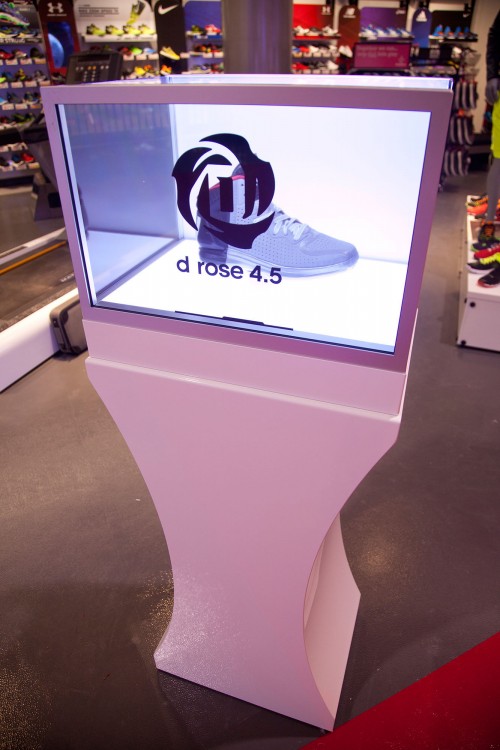 Transparent display cases feature digitally overlaid content.