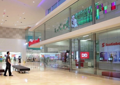 The ‘digital mural’ attracts customers with visual stories in what would otherwise be dead space.
