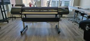 Roland VS‑540 Printer/Cutter – White & Metallic In photo.