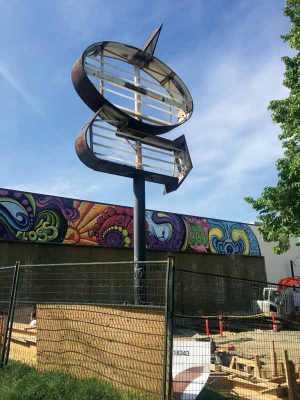 The existing concrete pad was sitting 0.3 m (12 in.) higher than that of the new building grade, which posed a significant risk to pedestrians. The existing concrete pad was sitting 0.3 m (12 in.) higher than that of the new building grade, which posed a significant risk to pedestrians.