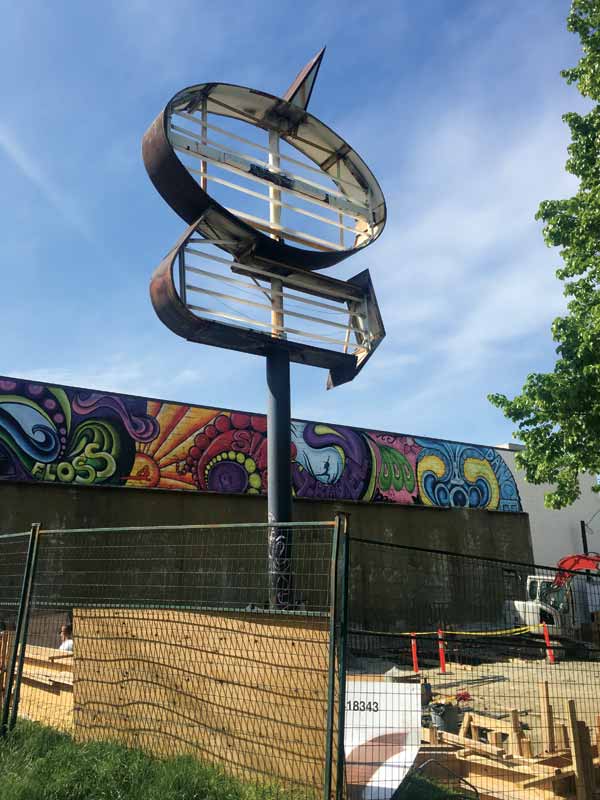 The existing concrete pad was sitting 0.3 m (12 in.) higher than that of the new building grade, which posed a significant risk to pedestrians. The existing concrete pad was sitting 0.3 m (12 in.) higher than that of the new building grade, which posed a significant risk to pedestrians.