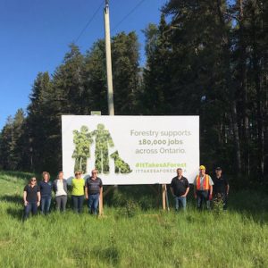 Photo courtesy Forests Ontario A new billboard is unveiled in Dryden, Ont., for the ‘It Takes a Forest’ initiative.