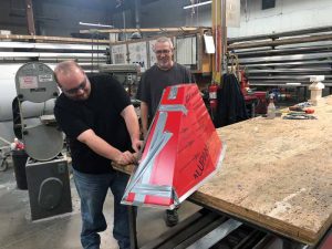 Wilson's Draftsman Eric Granholm, and metal fabricator Terry Companion, work through some production challenges.