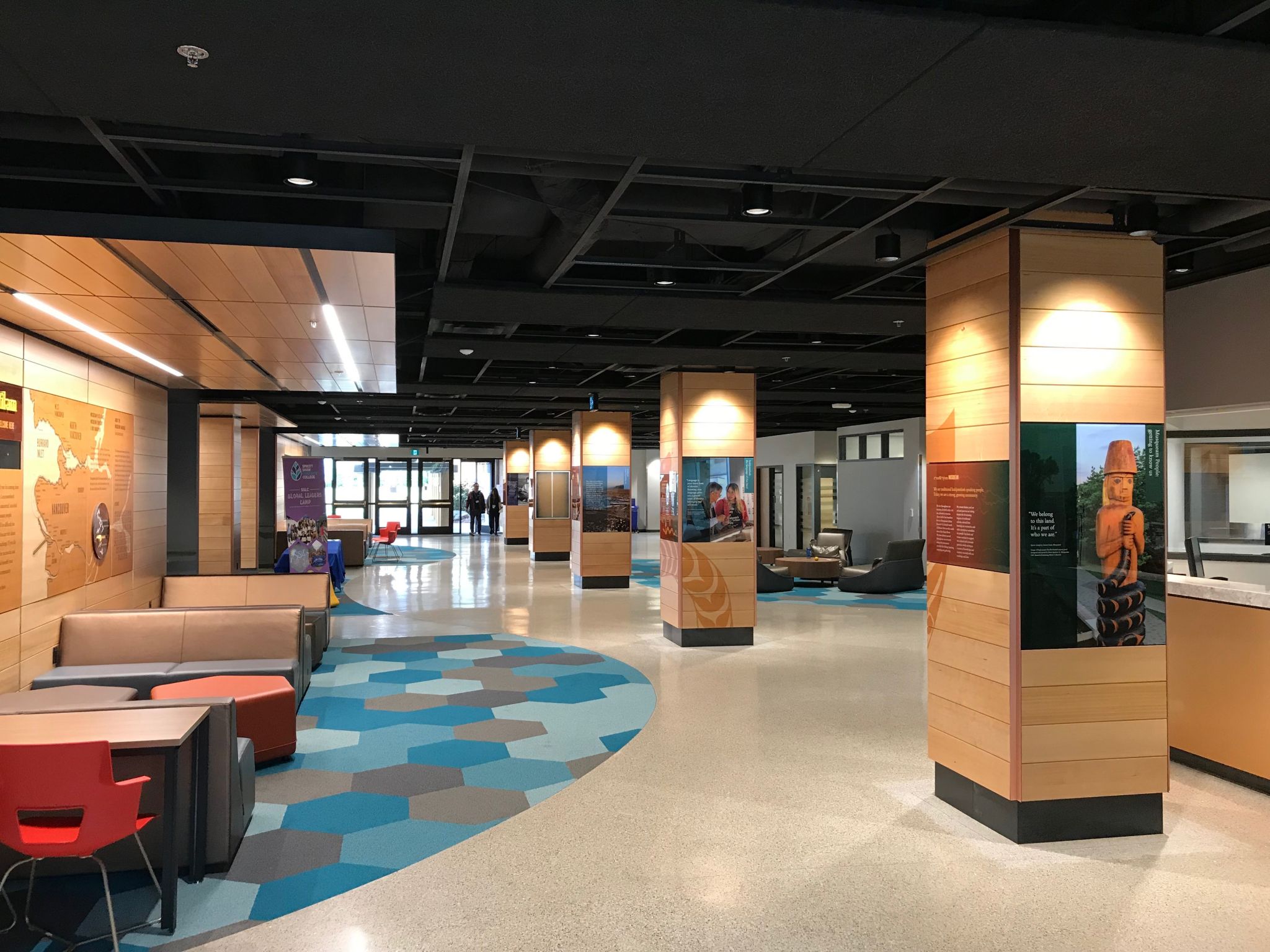 An additional wall sign, which consisted of 3D letters, acrylic plaque, and direct print on wood, was installed.