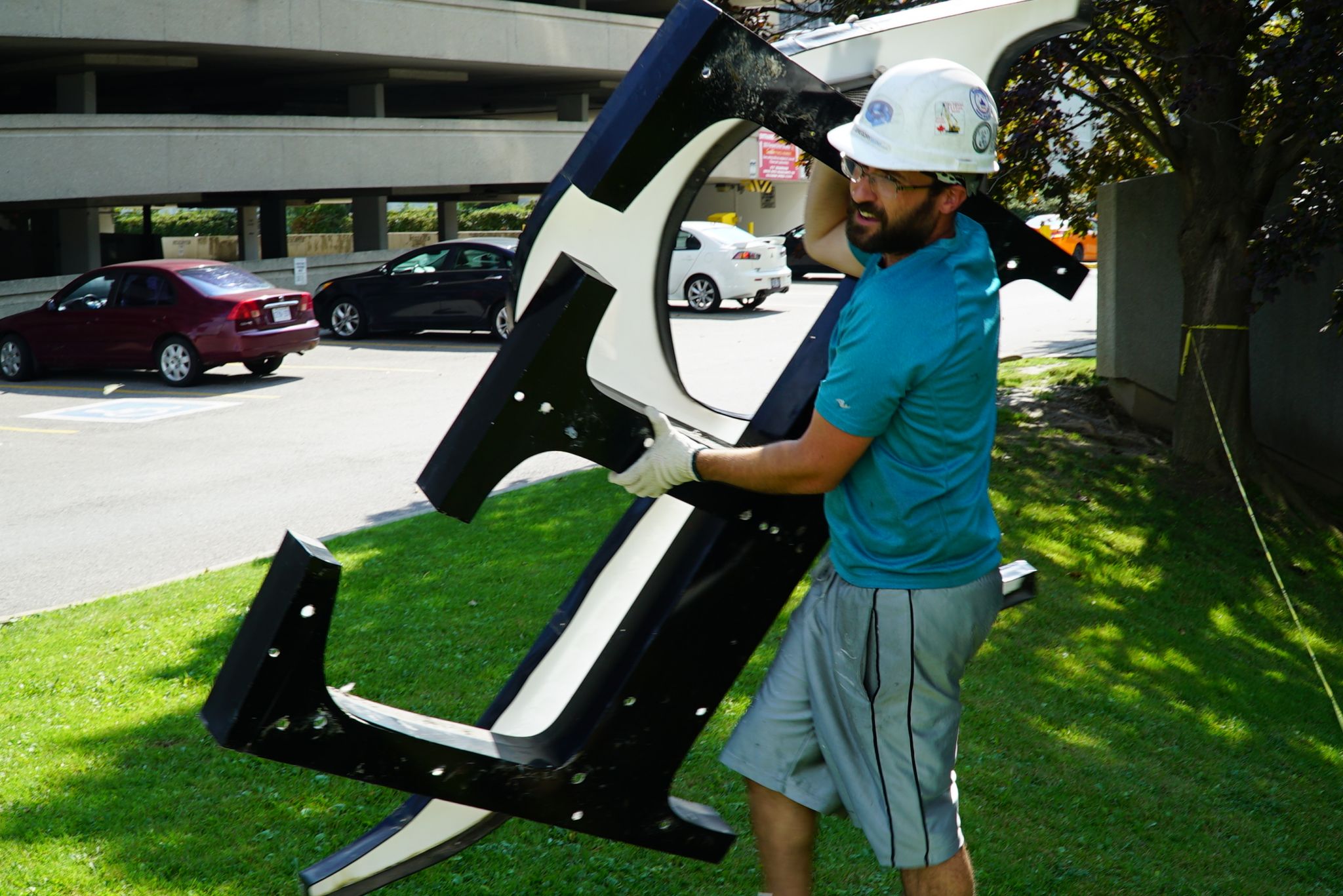 The letters were taken down and the individual components were carefully separated for disposal.