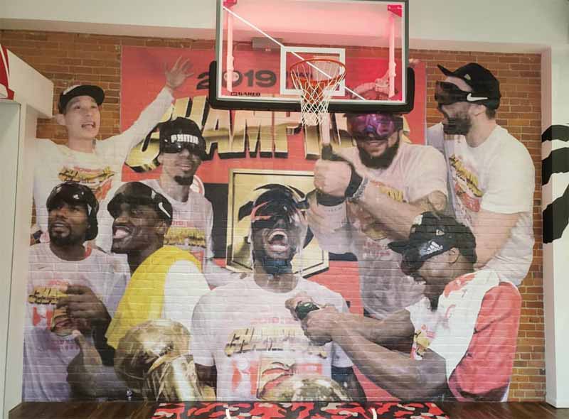 Sekanskin designed/photoshopped eight players from different photos to create a team shot of the champagne celebration as one did not exist. Many of the photos used as murals were conceptualized prior to a game’s conclusion. Sekanskin designed/photoshopped eight players from different photos to create a team shot of the champagne celebration as one did not exist. Many of the photos used as murals were conceptualized prior to a game’s conclusion.