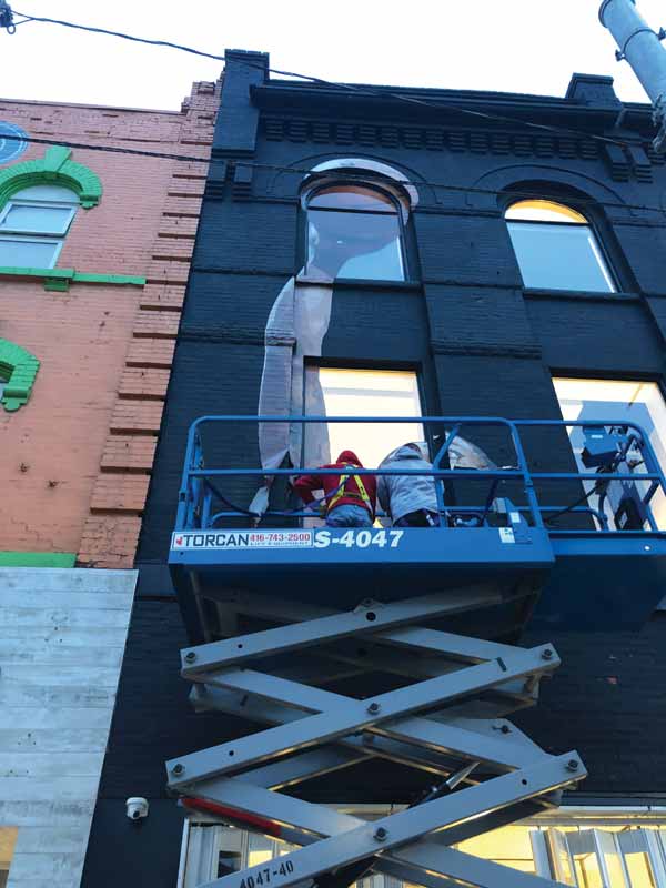 A scissor lift was used to install murals on the exterior of OD Toronto. The team quickly assembled upon the conclusion of games to update the mural upon Tetra’s request. Images were printed on panels of 3M graphic film, which was also laminated and trimmed. A scissor lift was used to install murals on the exterior of OD Toronto. The team quickly assembled upon the conclusion of games to update the mural upon Tetra’s request. Images were printed on panels of 3M graphic film, which was also laminated and trimmed.
