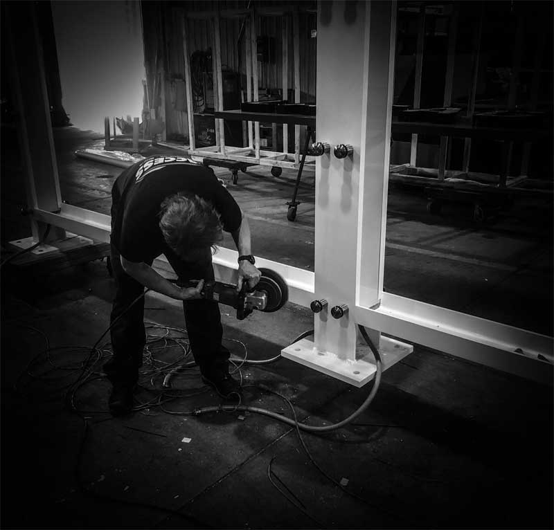 Final touches are applied on the tempered glass light-emitting diode (LED) wall for the tour’s exterior courtyard. Final touches are applied on the tempered glass light-emitting diode (LED) wall for the tour’s exterior courtyard.