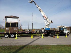 Photo courtesy Signature Sign & Image Installers must make sure they are within a safe distance from powerlines.