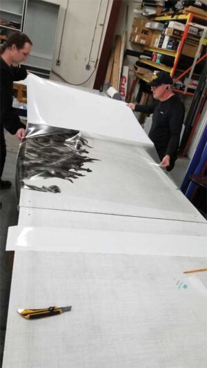 Next, the hood graphics were printed on 3M IJ180 clear film so the finish of the vehicle would show through and the end result would look painted on.