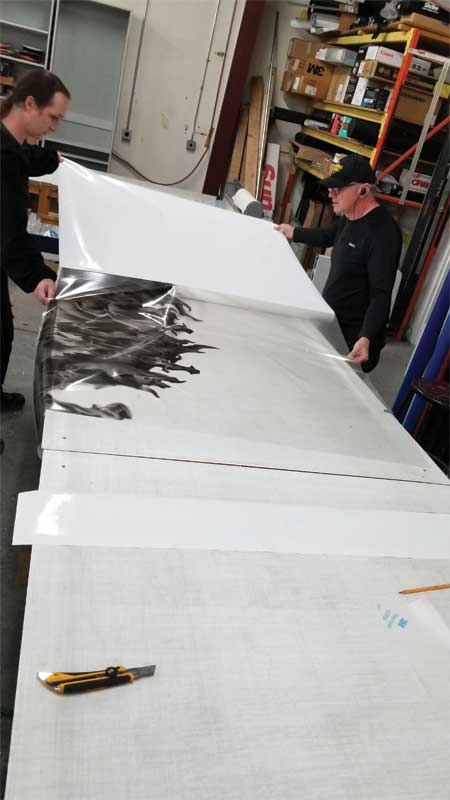 Next, the hood graphics were printed on 3M IJ180 clear film so the finish of the vehicle would show through and the end result would look painted on.