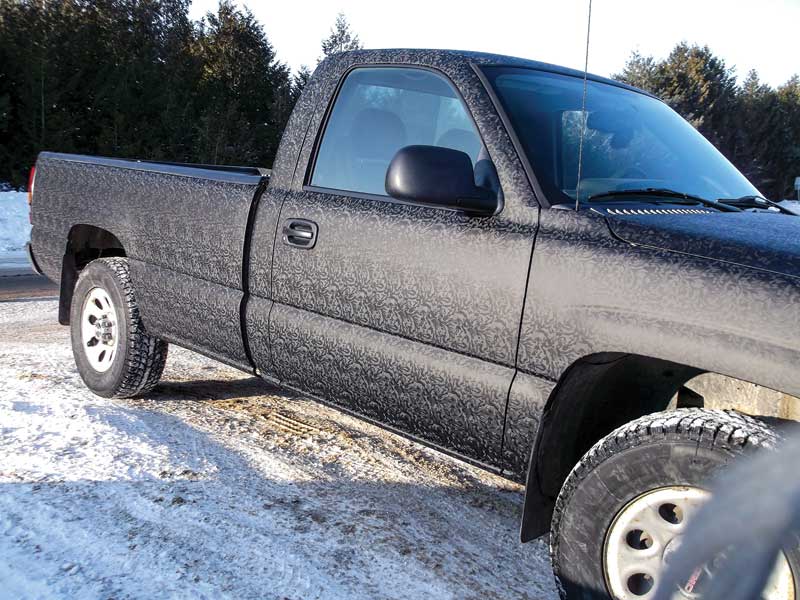 A black patterned truck.