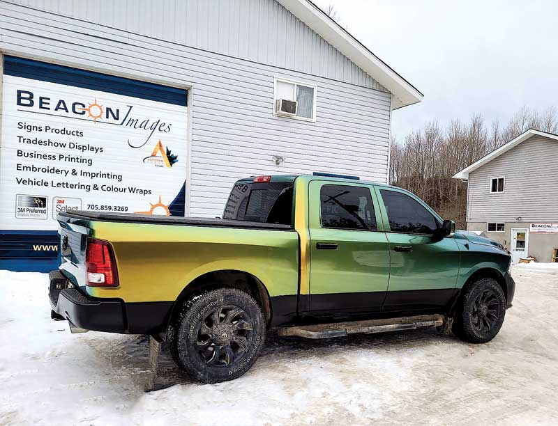 A green and yellow ombre truck.
