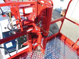A standing winch in a boom truck basket.