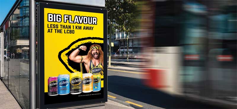 The ad running at a bus stop.
