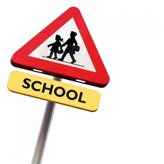 A stock image of a school zone sign.