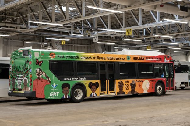 A full view of one side of the bus completely wrapped.