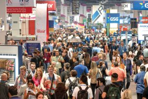 People on the floor at the expo. 