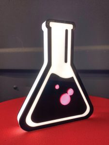An acrylic channel letter in the same of a tube.