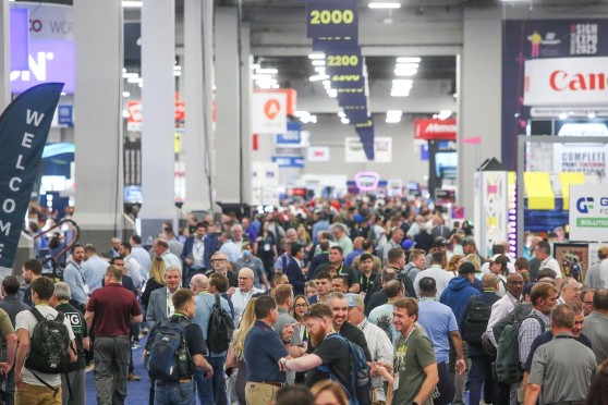 People walk the floor at the ISA Sign Expo.