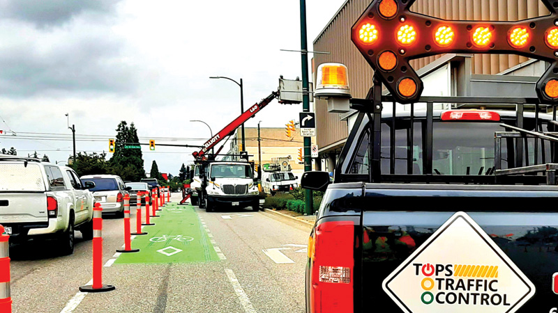 A secure perimeter is blocked and signs are placed to direct traffic.