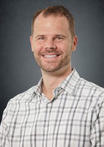 A headshot of Jay Kroll.