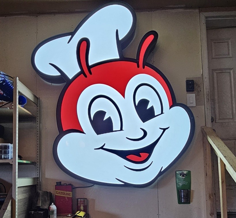 The Jollibee sign in Houde's basement.