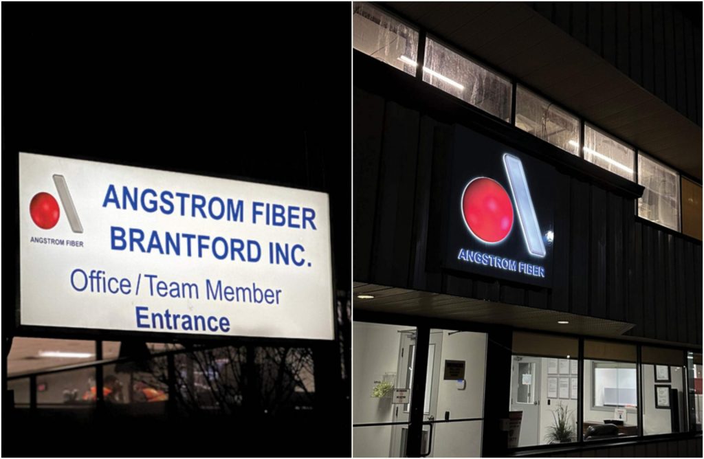 The exterior signs illuminated at night.