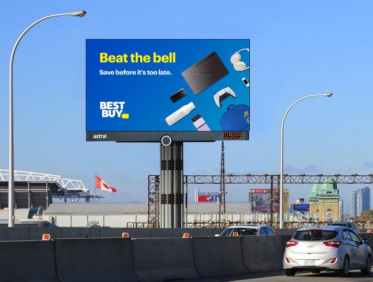 An outdoor ad on a street.
