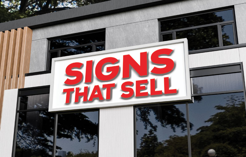 An exterior sign with "Signs that sell" written on it.