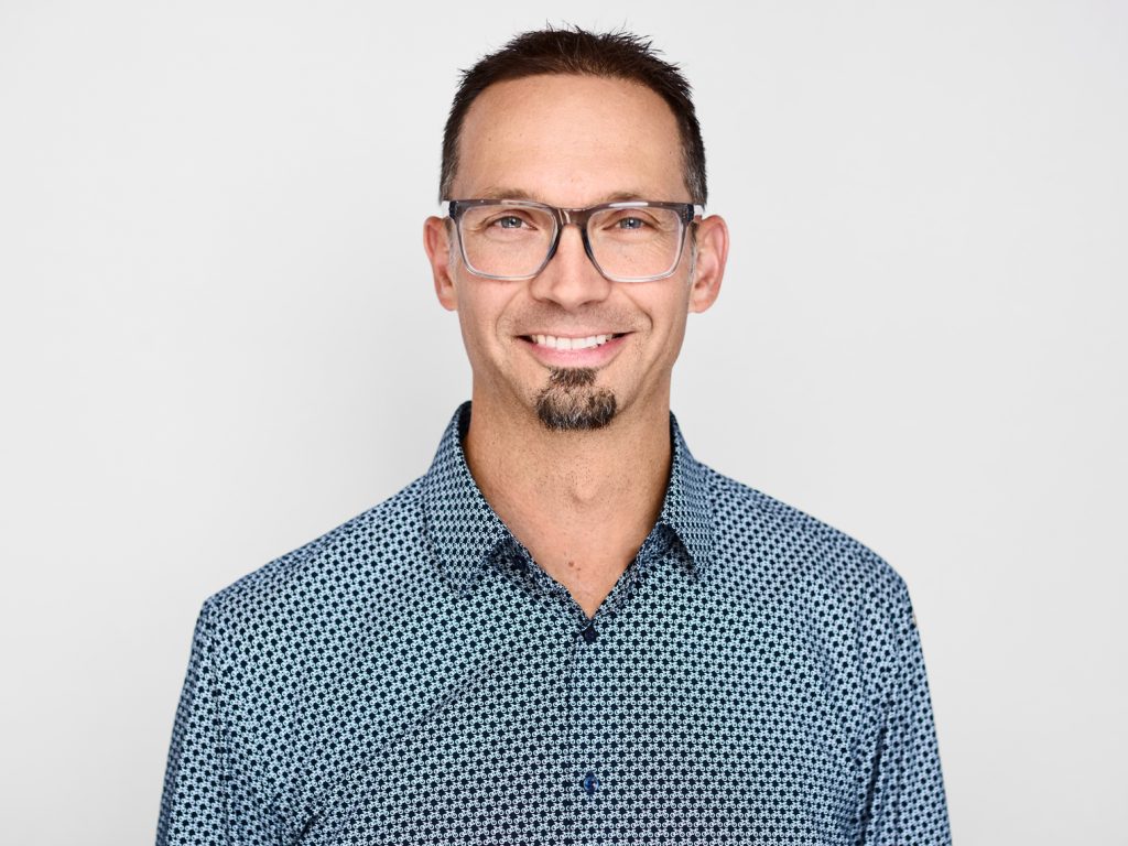 A headshot of Nick Hansen