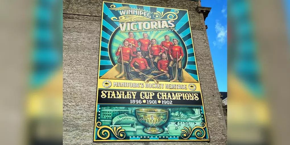 A full view of the mural on the wall.