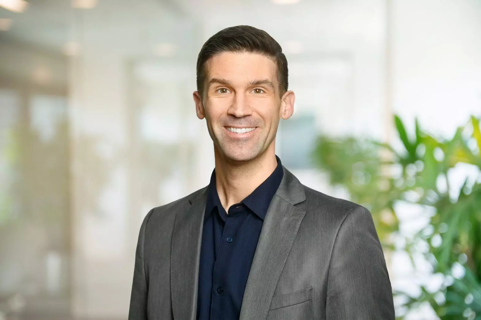 A headshot of Justin Boudreau.