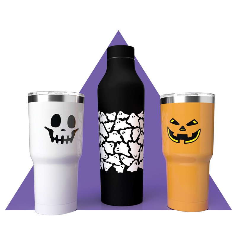 Three Halloween-themed drink containers: white skull tumbler, black bottle with white ghosts, and orange tumbler with jack-o'-lantern face.