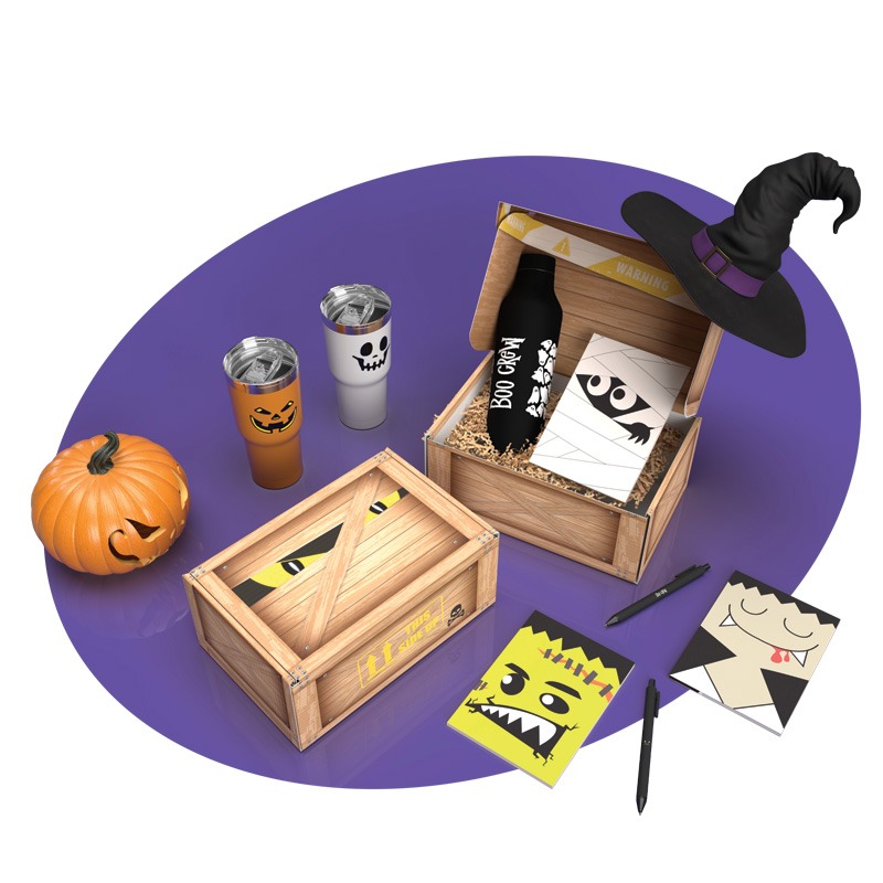 Halloween-themed items including a pumpkin, decorated drink tumblers, wooden crates with monster eyes, a witch hat, and spooky notebooks on a purple background.