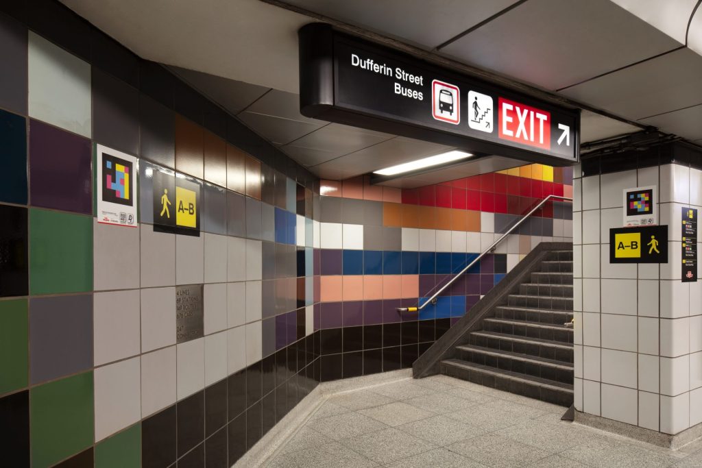 Navigation signs at the entrance/exit points at Dufferin Station. 