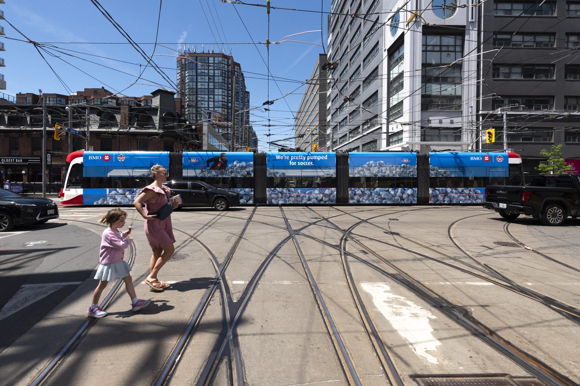 Toronto streetcar wrapped in BMO Canada Soccer "We're pretty pumped for soccer" advertising.