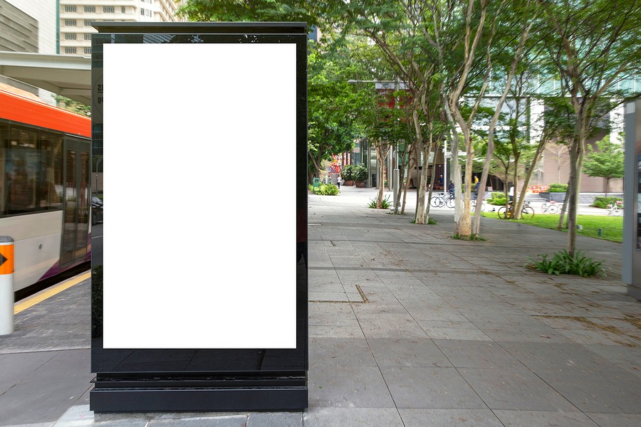Digital sign in an outdoor area.